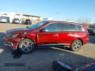 2020 Infiniti QX60 Luxe with VIN 5N1DL0MM0LC511566, listed as a IAAI auction lot 40879519 with 90,479 mi miles and . Bid and sale history available at DreamBid. Image 14.