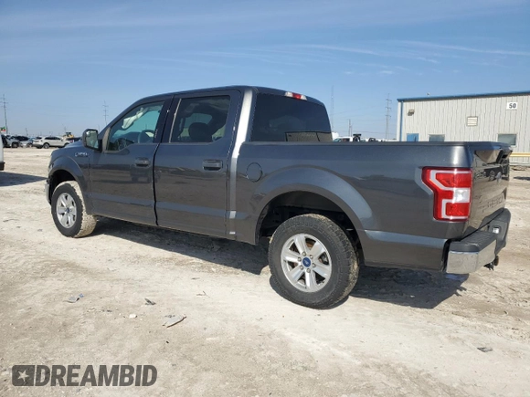 2020 Ford F-150 XL with VIN 1FTEW1C4XLFA23862, listed as a Copart auction lot 45156215 with 104,872 mi miles and Salvage Title. Bid and sale history available at carsss.com. Image 2.