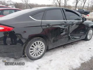 2014 Ford Fusion SE Hybrid with VIN 3FA6P0LUXER236740, listed as a IAAI auction lot 41399510 with 82,720 mi miles. Bid and sale history available at carsss.com. Image 13.