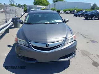 2013 Acura ILX Tech Pkg with VIN 19VDE1F7XDE007976, listed as a IAAI auction lot 42052098 with 119,494 mi miles. Bid and sale history available at carsss.com. Image 12.