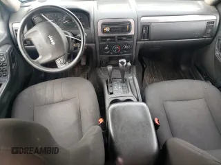 2004 Jeep Grand Cherokee Laredo z VIN 1J4GW48S14C288605, wystawiony jako Copart lot #60204815 z przebiegiem 247 816 mil mil oraz Szkoda całkowita • Salvage title. Historia ofert i sprzedaży dostępna na DreamBid. Obrazek 8.