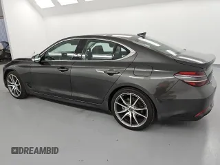 2023 Genesis G70 2.0T with VIN KMTG34TA9PU128257, listed as a Copart auction lot 75609134 with 21,969 mi miles and Salvage Title. Bid and sale history available at carsss.com. Image 2.