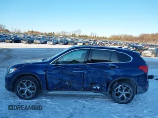 2019 BMW X1 xDrive28i z VIN WBXHT3C54K5L36472, wystawiony jako IAAI lot #41391927 z przebiegiem 88 950 mil mil oraz . Historia ofert i sprzedaży dostępna na DreamBid. Obrazek 15.