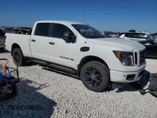2019 Nissan Titan XD SV with VIN 1N6BA1F45KN513687, listed as a Copart auction lot 80859944 with 154,173 mi miles and Clean Title. Bid and sale history available at carsss.com. Image 4.