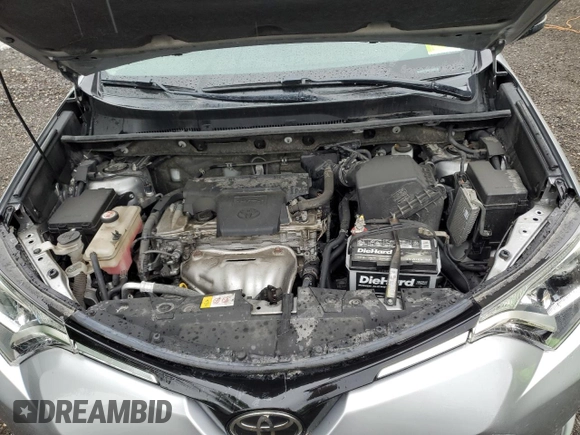 2018 Toyota RAV4 XLE with VIN JTMRFREV2JJ200677, listed as a Copart auction lot 59660535 with 82,283 mi miles and Salvage title. Bid and sale history available at DreamBid. Image 12.