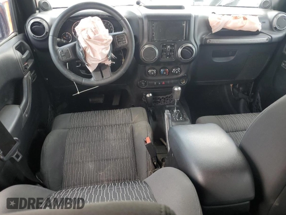 2012 Jeep Wrangler Unlimited Sport z VIN 1C4BJWDG4CL243538, wystawiony jako Copart lot #58826675 z przebiegiem 126 646 mil mil oraz Szkoda całkowita • Salvage title. Historia ofert i sprzedaży dostępna na DreamBid. Obrazek 8.