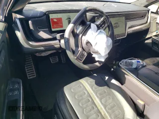 2023 Rivian R1T Adventure with VIN 7FCTGBAA8PN027711, listed as a Copart auction lot 49449155 with 16,031 mi miles and Salvage Title. Bid and sale history available at carsss.com. Image 8.