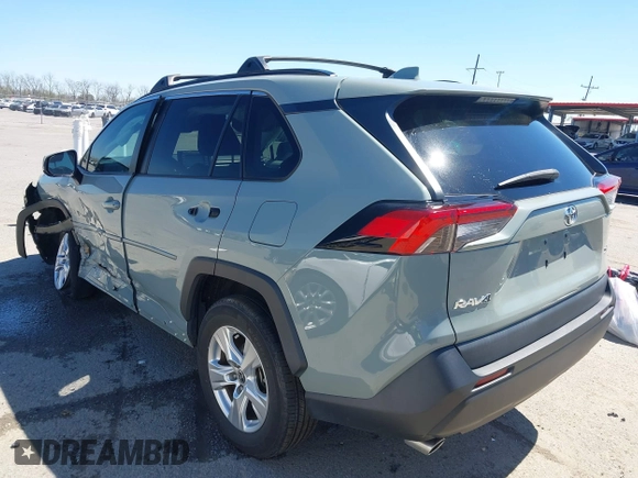 2021 Toyota RAV4 XLE with VIN 2T3W1RFV2MW137411, listed as a IAAI auction lot 41781029 with 80,002 mi miles. Bid and sale history available at carsss.com. Image 3.