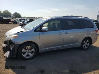 2015 Toyota Sienna LE AAS with VIN 5TDKK3DC7FS566011, listed as a Copart auction lot 62338485 with 157,751 mi miles and Salvage title. Bid and sale history available at DreamBid. Image 1.