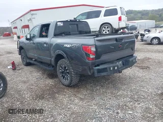 2021 Nissan Titan Pro-4X with VIN 1N6AA1ED3MN531332, listed as a IAAI auction lot 41918065 with 125,323 mi miles and . Bid and sale history available at DreamBid. Image 3.