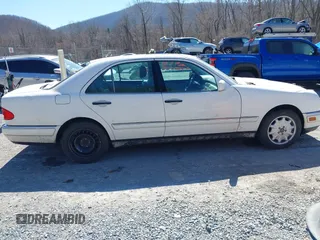 1999 Mercedes-Benz E-Class with VIN WDBJF82H4XX025925, listed as a IAAI auction lot 41839398 with 238,583 mi miles. Bid and sale history available at carsss.com. Image 13.