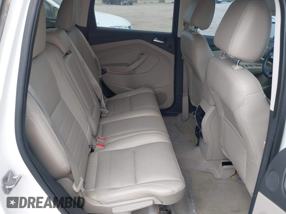 2014 Ford Escape SE with VIN 1FMCU9GX9EUB15944, listed as a IAAI auction lot 42110269 with 120,297 mi miles and . Bid and sale history available at DreamBid. Image 8.