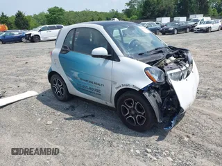 2016 Smart fortwo Passion z VIN WMEFJ5DA4GK069572, wystawiony jako IAAI lot #42161416 z przebiegiem 51 603 mil mil oraz . Historia ofert i sprzedaży dostępna na DreamBid. Obrazek 1.