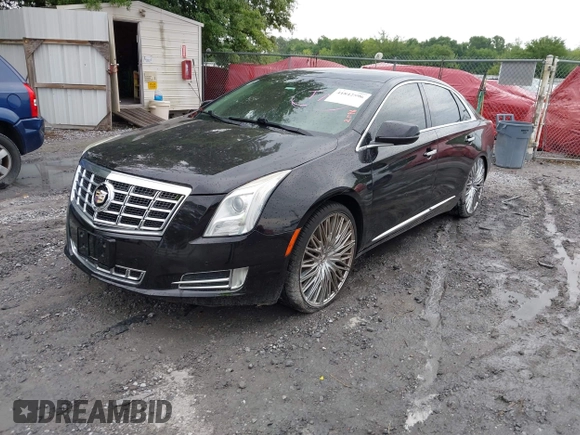 2014 Cadillac XTS Luxury z VIN 2G61N5S38E9292684, wystawiony jako IAAI lot #41842596 z przebiegiem 130 318 mil mil oraz . Historia ofert i sprzedaży dostępna na DreamBid. Obrazek 17.