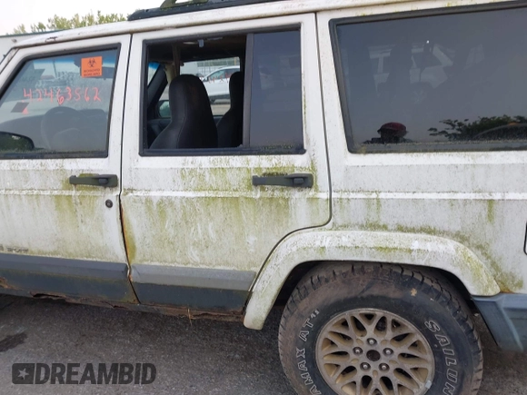 1999 Jeep Cherokee Sport z VIN 1J4FF68S0XL663735, wystawiony jako IAAI lot #42463562 z przebiegiem Nie podano mil oraz . Historia ofert i sprzedaży dostępna na DreamBid. Obrazek 13.