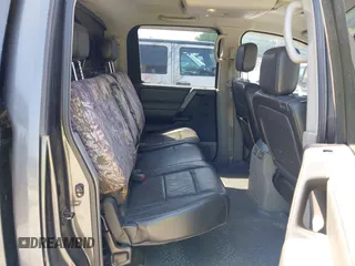 2004 Nissan Titan LE with VIN 1N6AA07B04N546666, listed as a IAAI auction lot 42045671 with 280,796 mi miles. Bid and sale history available at carsss.com. Image 8.