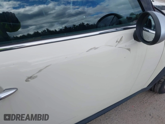 2011 MINI Hardtop S with VIN WMWSV3C58BTY22854, listed as a IAAI auction lot 42034126 with 98,931 mi miles and . Bid and sale history available at DreamBid. Image 6.