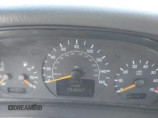 2001 Mercedes-Benz E-Class with VIN WDBJH65J31B381879, listed as a IAAI auction lot 41855504 with 153,667 mi miles. Bid and sale history available at carsss.com. Image 7.