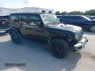 2022 Jeep Wrangler Unlimited Sahara with VIN 1C4JJXP60NW153776, listed as a IAAI auction lot 42108916 with 39,123 mi miles and . Bid and sale history available at DreamBid. Image 1.