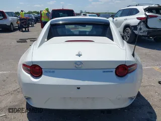2021 Mazda MX-5 Miata Grand Touring z VIN JM1NDAM75M0450871, wystawiony jako IAAI lot #42060495 z przebiegiem 48 670 mil mil oraz . Historia ofert i sprzedaży dostępna na DreamBid. Obrazek 16.
