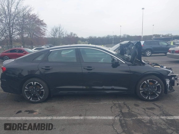 2024 Kia K5 GT-Line z VIN 5XXG64J22RG257080, wystawiony jako IAAI lot #42026127 z przebiegiem 19 477 mil mil oraz . Historia ofert i sprzedaży dostępna na DreamBid. Obrazek 13.