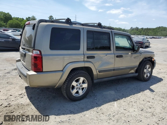 2006 Jeep Commander with VIN 1J8HG48N06C274675, listed as a Copart auction lot 54521835 with 134,587 mi miles and Salvage Title. Bid and sale history available at DreamBid. Image 3.