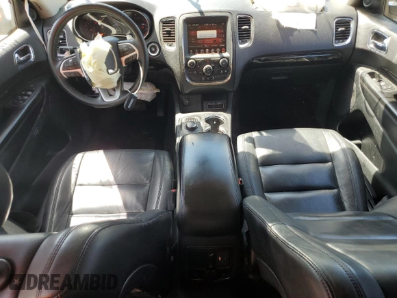 2014 Dodge Durango Limited z VIN 1C4RDHDG5EC313892, wystawiony jako Copart lot #52634355 z przebiegiem 167 053 mil mil oraz Szkoda całkowita • Salvage title. Historia ofert i sprzedaży dostępna na DreamBid. Obrazek 8.