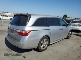 2011 Honda Odyssey Touring с VIN 5FNRL5H92BB063040, выставлен на аукционе Copart как лот 58551765 с пробегом 236 526 миль миль и Списание • Salvage title. История ставок и продаж доступна на DreamBid. Изображение 3.