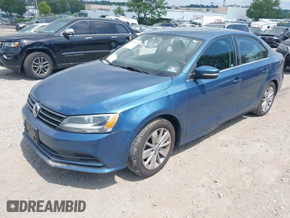 2015 Volkswagen Jetta SE with VIN 3VWD17AJ6FM231597, listed as a IAAI auction lot 42718275 with Not provided miles and . Bid and sale history available at DreamBid. Image 2.