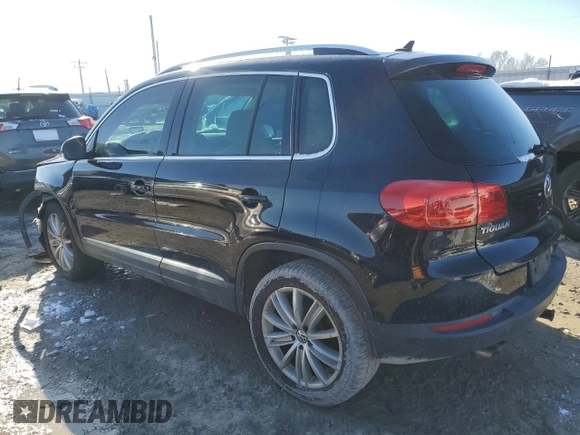 2015 Volkswagen Tiguan SE z VIN WVGBV7AX9FW516731, wystawiony jako Copart lot #49508815 z przebiegiem 172 072 mil mil oraz Szkoda całkowita • Salvage title. Historia ofert i sprzedaży dostępna na DreamBid. Obrazek 2.