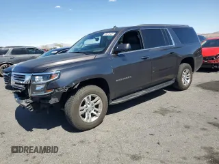2015 Chevrolet Suburban LS z VIN 1GNSCHKC4FR257311, wystawiony jako Copart lot #55975425 z przebiegiem 193 728 mil mil oraz Szkoda całkowita • Salvage title. Historia ofert i sprzedaży dostępna na DreamBid. Obrazek 1.