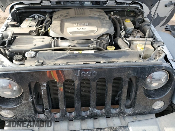 2015 Jeep Wrangler Unlimited Willys Wheeler with VIN 1C4BJWDG7FL690952, listed as a Copart auction lot 51493715 with 45,497 mi miles and Salvage Title. Bid and sale history available at DreamBid. Image 13.