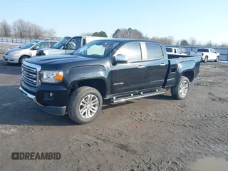2015 GMC Canyon 4WD SLT with VIN 1GTG6CE34F1153369, listed as a IAAI auction lot 41277810 with 135,821 mi miles. Bid and sale history available at carsss.com. Image 18.
