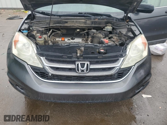 2010 Honda CR-V EX z VIN 5J6RE4H5XAL015745, wystawiony jako Copart lot #56214765 z przebiegiem 246 500 mil mil oraz Szkoda całkowita • Salvage title. Historia ofert i sprzedaży dostępna na DreamBid. Obrazek 12.