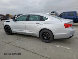 2018 Chevrolet Impala Premier with VIN 2G1125S37J9178572, listed as a Copart auction lot 50727865 with 130,423 mi miles and Salvage Title. Bid and sale history available at DreamBid. Image 2.