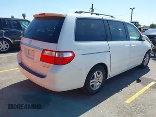 2005 Honda Odyssey TOURING with VIN 5FNRL38865B083615, listed as a IAAI auction lot 41993430 with 86,636 mi miles. Bid and sale history available at carsss.com. Image 4.