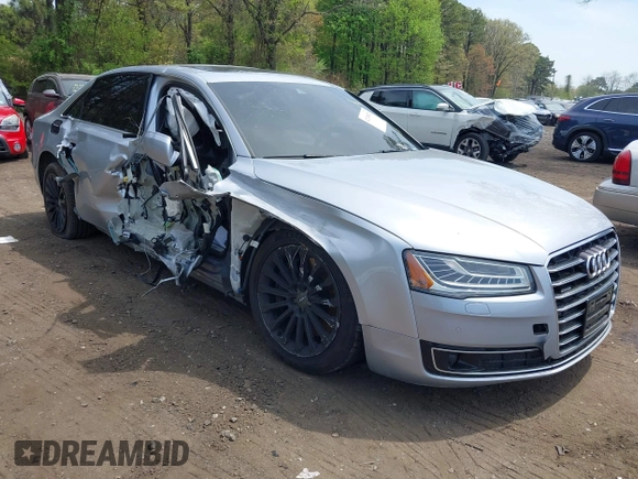 2015 Audi A8 4.0T z VIN WAU32AFD2FN038880, wystawiony jako IAAI lot #42138932 z przebiegiem 102 968 mil mil oraz . Historia ofert i sprzedaży dostępna na DreamBid. Obrazek 1.