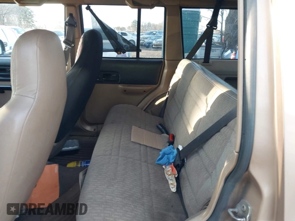 1999 Jeep Cherokee Sport with VIN 1J4FF68S2XL554452, listed as a IAAI auction lot 41930116 with 194,230 mi miles and . Bid and sale history available at DreamBid. Image 8.