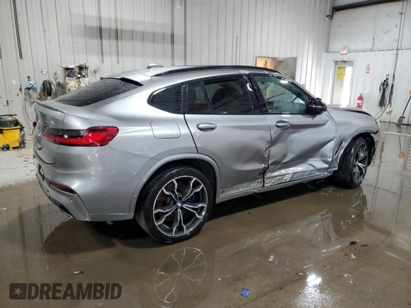 2021 BMW X4 M z VIN 5YMUJ0C05M9E04935, wystawiony jako Copart lot #42149535 z przebiegiem Nie podano mil oraz Szkody całkowita. Historia ofert i sprzedaży dostępna na DreamBid. Obrazek 3.