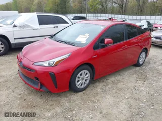 2021 Toyota Prius L Eco with VIN JTDKAMFU6M3134586, listed as a IAAI auction lot 41909538 with 55,355 mi miles. Bid and sale history available at carsss.com. Image 18.