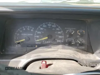 1999 GMC Yukon with VIN 1GKEK13R9XJ740395, listed as a Copart auction lot 83801394 with 185,305 mi miles and Salvage Title. Bid and sale history available at carsss.com. Image 9.