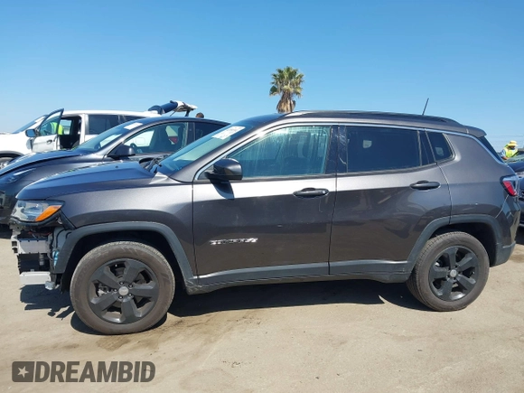 2021 Jeep Compass Latitude with VIN 3C4NJDBB1MT578819, listed as a IAAI auction lot 42288394 with 43,208 mi miles and . Bid and sale history available at DreamBid. Image 14.