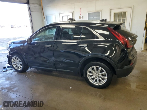 2022 Cadillac XT4 AWD Luxury with VIN 1GYFZBR45NF145986, listed as a Copart auction lot 79198274 with 23,477 mi miles and Salvage Title. Bid and sale history available at carsss.com. Image 2.