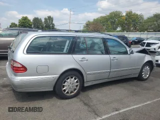 2001 Mercedes-Benz E-Class with VIN WDBJH65J41B201471, listed as a Copart auction lot 68863194 with 106,893 mi miles and Salvage Title. Bid and sale history available at carsss.com. Image 3.