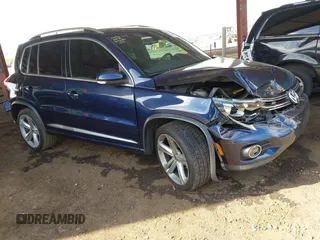 2015 Volkswagen Tiguan R-Line z VIN WVGAV7AX8FW611275, wystawiony jako IAAI lot #42348555 z przebiegiem 158 737 mil mil oraz . Historia ofert i sprzedaży dostępna na DreamBid. Obrazek 1.
