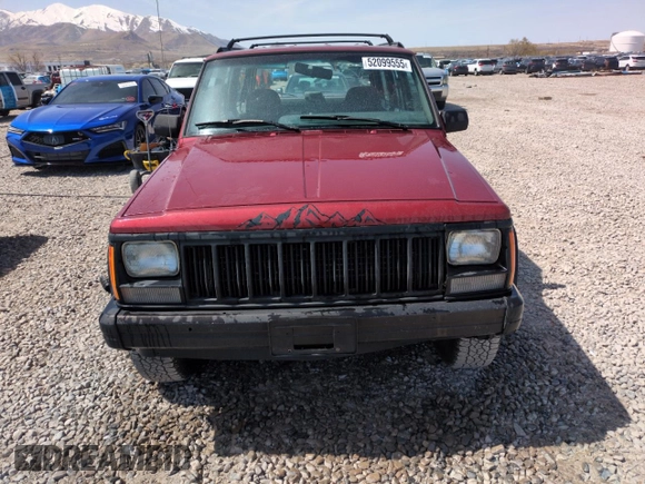 1996 Jeep Cherokee Sport with VIN 1J4FJ68S6TL171056, listed as a Copart auction lot 52099555 with 250,089 mi miles and Salvage Title. Bid and sale history available at carsss.com. Image 5.