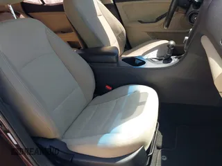 2014 Kia Optima LX with VIN 5XXGM4A77EG274839, listed as a IAAI auction lot 41976091 with 130,517 mi miles. Bid and sale history available at carsss.com. Image 5.