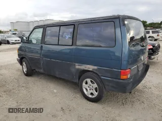 1993 Volkswagen EuroVan с VIN WV2MC0707PH010911, выставлен на аукционе Copart как лот 78414594 с пробегом 191 174 миль миль и Чистый • Clean title. История ставок и продаж доступна на DreamBid. Изображение 2.