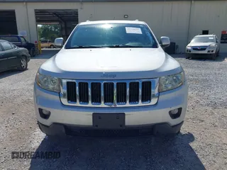 2011 Jeep Grand Cherokee Laredo with VIN 1J4RR4GG2BC714893, listed as a IAAI auction lot 42750763 with 184,475 mi miles and . Bid and sale history available at DreamBid. Image 6.
