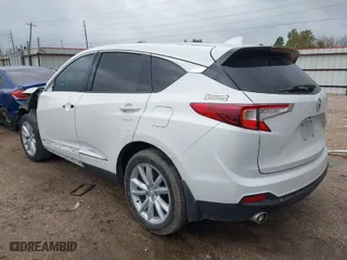 2020 Acura RDX with VIN 5J8TC1H38LL011552, listed as a IAAI auction lot 40999575 with 164,232 mi miles. Bid and sale history available at carsss.com. Image 3.